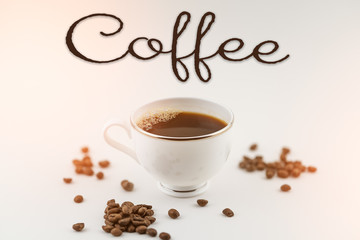 cup of coffee with beans on white background with flare and text