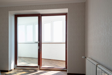 interior of a new apartment unfurnished kitchen bathroom balcony