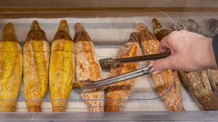 baguettes on a counter in a bakery