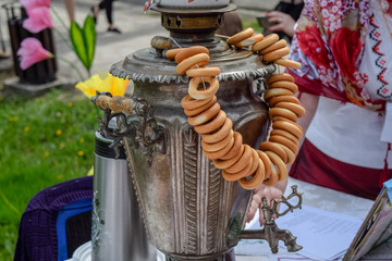 samovar with bagels on the table. Peoples traditional festival.