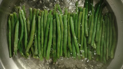TOP VIEW: Organic Green Beans Boiling In A Metal Pot