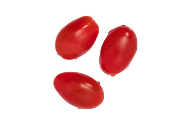 Fresh plum tomatoes on white background
