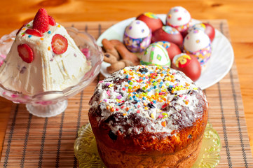 Orthodox Easter traditional homemade meals: cottage cheese dessert paska, decorated eggs and easter cake kulich