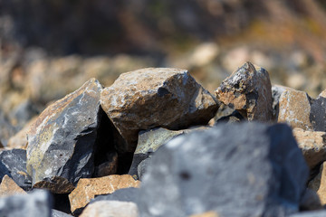 Industrial photography. Volcanic rock at the quarry. Natural stone for the manufacture of blocks...