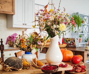 autumn vegetables and flowers in the kitchen