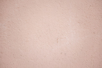 Pink cement wall dirty background for texture abstract