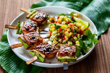 Salmon and spring onion skewers with soy and wasabi glaze