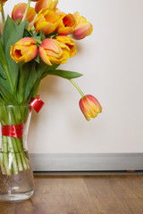 Yellow tulips are spring flowers. The concept of such holidays as March 8, spring day, birthday.