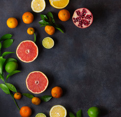 Fruit on a dark background. Citrus fruits, healthy food concept. Fresh fruit.