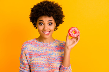 Yummy snack concept. Positive cheerful afro american girl feel hungry hold tasty delicious cake...