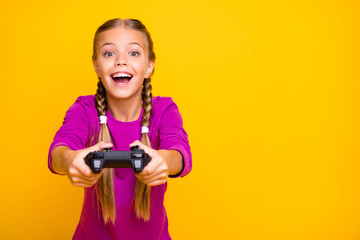Close-up portrait of her she nice attractive lovely excited cheerful cheery girl playing video game...