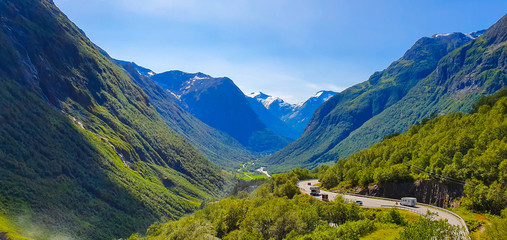 Naklejka na ściany i meble valley with road in the summer in Norway