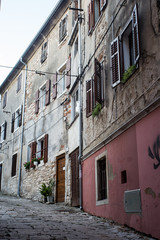 Fototapeta na wymiar Streets and houses in town Pula in Croatia