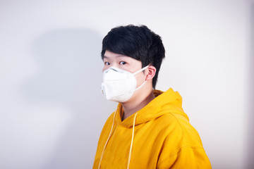 A man wearing a N95 medical protective mask