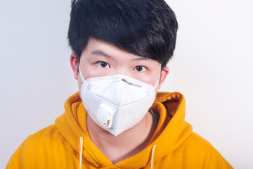 A man wearing a N95 medical protective mask