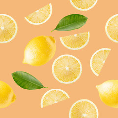 pattern with lemon slices and leaves on a light orange background