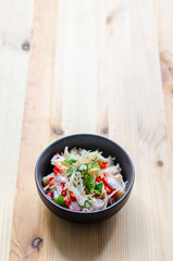 Jelly fish hot spicy and sour salad on wooden table, Thai food thai style.