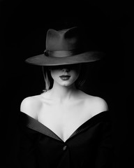 Style woman in hat. Portrait of black and white color style