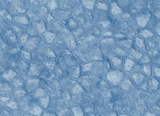 refreshing rain on heat-cracked ground in the desert