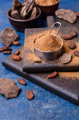 Cocoa powder in a metal sieve