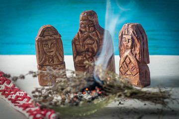 Slavic mystical ritual, CLEANING SPACE OF SMOKE OF MEDICINAL HERBS. In front of the idols of the...