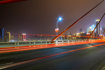 Fototapeta na wymiar Expressway on Yangtze River Bridge and Modern City Scenery in Chongqing, China