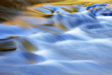 Abstract landscape of the Presque Isle River rapids captured with motion blur, Porcupine Mountains...