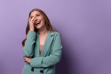 Positive woman posing indoors isolated