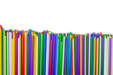 Colorful plastic tubules isolated on white.