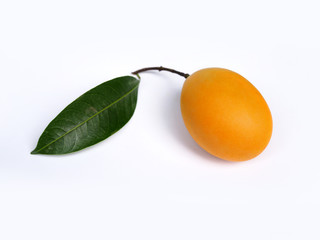 Sweet yellow marian plum fruit, maprang or mayongchid with green leaves isolated on white...