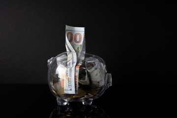 Piggy bank and black background with saving concept.