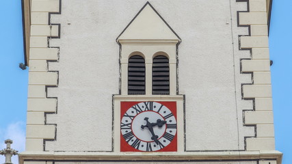 Fototapeta na wymiar Clock on tower of St. Mark Church at St. Mark Square timelapse. Zagreb, Croatia