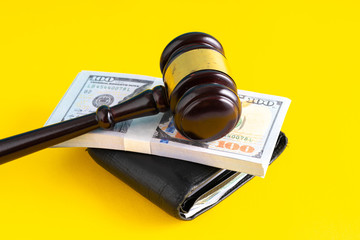 Wallet with yellow background. Financial concept.