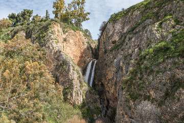 HaTanur  waterfall flows from a crevice in the mountain and is located in the continuation of the rapid, shallow, cold mountain Ayun river in the Galilee in northern Israel