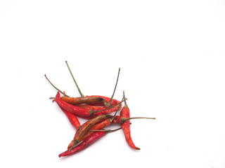 A lot of dried red Capsicum annuum L.,Chilli Padi, Bird's Eye Chilli, Bird Chilli,Thai pepper isolate on white background.