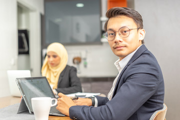 Business couple with workplace enviroment