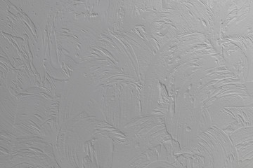 decorative plaster walls. drawing with a spatula. grey texture. Texture, background image. Abstraction.