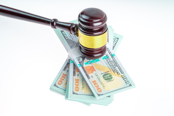 Gavel hammer and banknote with white background