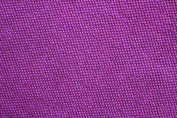 Violet texture background of colorful cloth pattern. Blank vivid violet fabric texture, seamless rough clothes surface wallpaper, plain blank shirt element