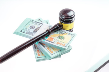 Gavel hammer and banknote with white background