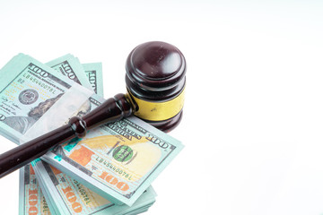 Gavel hammer and banknote with white background