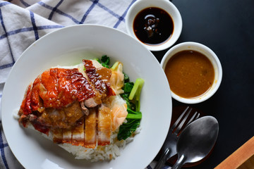 Rice roasted duck and crispy skin pork belly with gravy sauce
