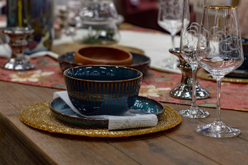 Green tea mug on table. Fron view. Holiday.