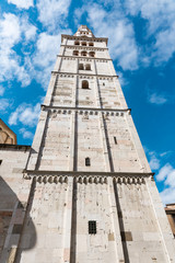 Fototapeta na wymiar Ghirlandina Tower. Metropolitan Cathedral of Saint Mary of the Assumption and Saint Geminianus. Modena, Italy
