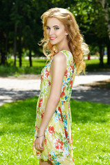 Fototapeta premium girl in a multicolored dress