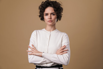 Image of displeased caucasian woman posing and looking at camera