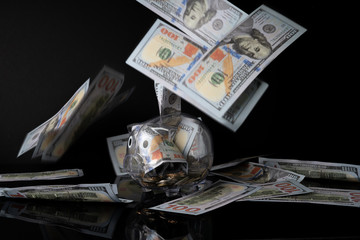 Piggy bank and black background with saving concept.