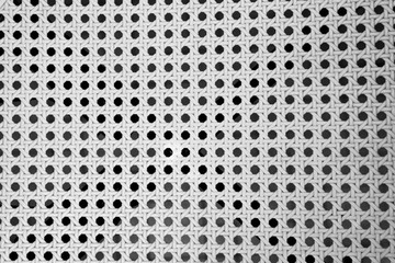 abstract metal background with holes