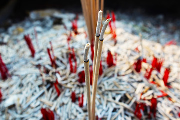 The incense sticks placed in the incense burner