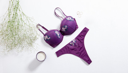 purple stylish underwear on white background shopping and fashion concept.
